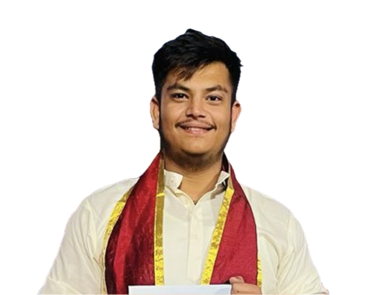 A man in a blue shirt with a happy expression